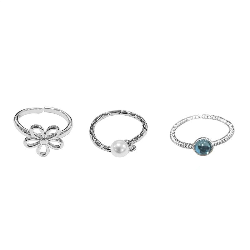 Damen Ring-Set mit filigranen Blütenmotiven und elegantem Edelsteindetail Shop Nory