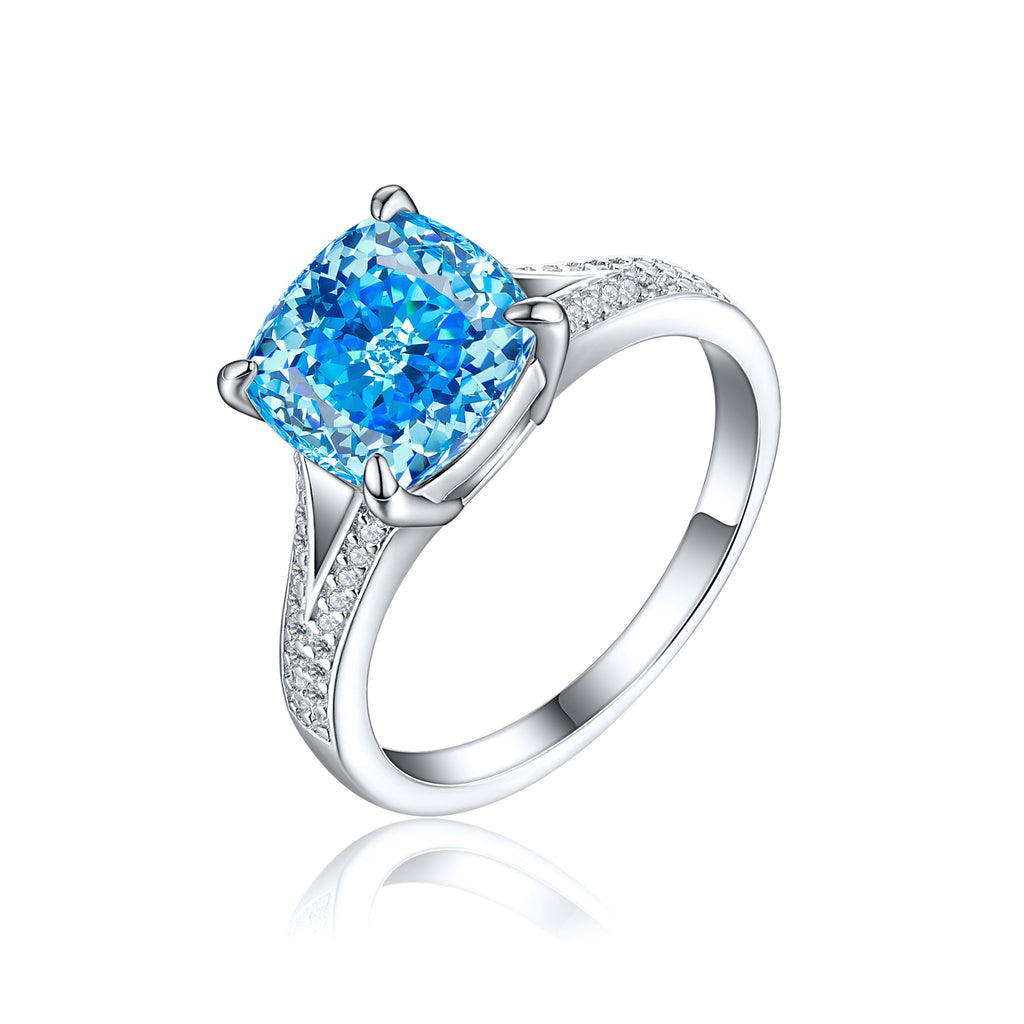 Damen Ring mit funkelndem Aquamarin und kunstvollen Zirkonia-Besatz Shop Nory