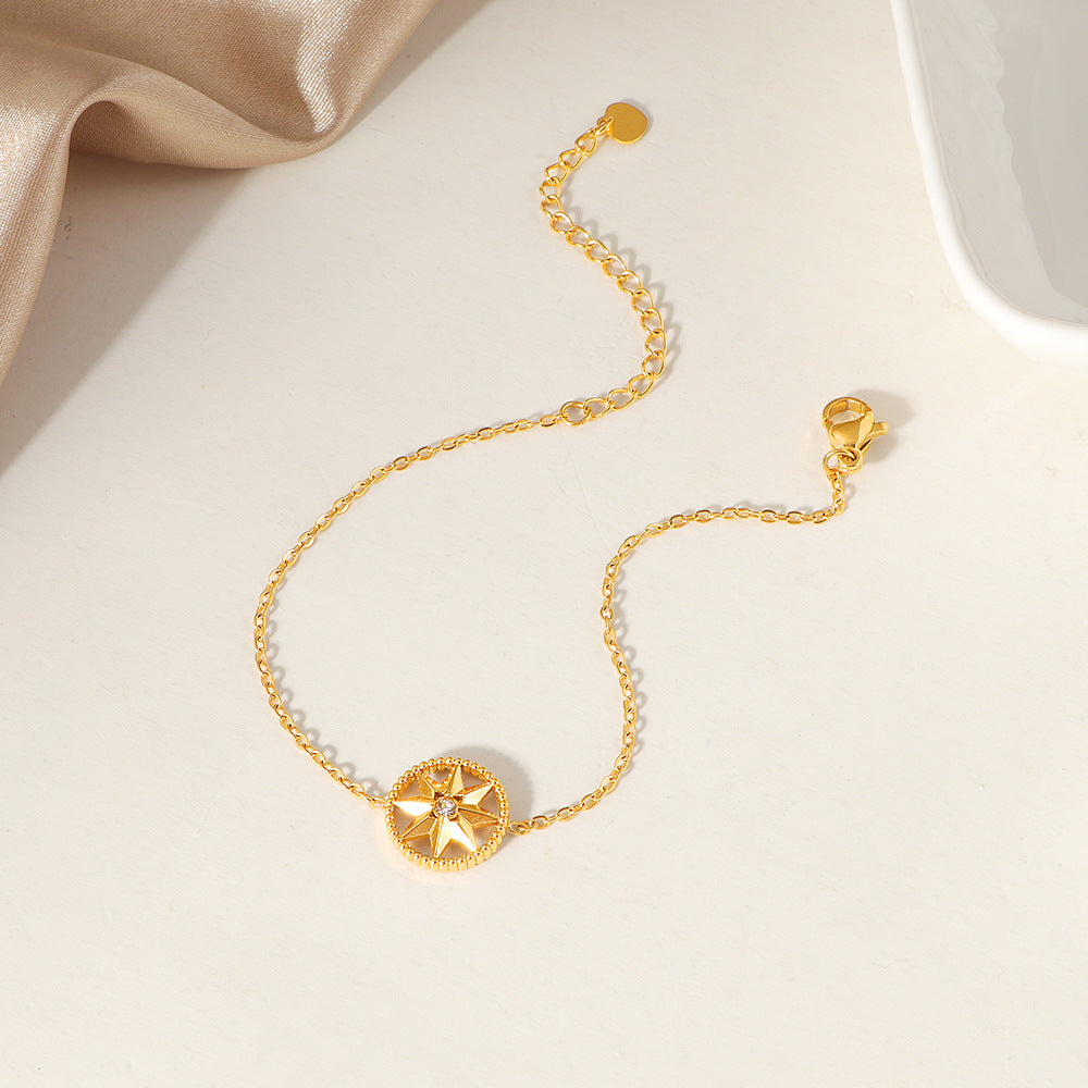 Frauen Kompass-inspirierte Charm-Armbanduhr Shop Nory
