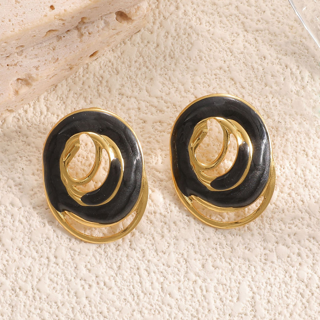Damen Ohrstecker mit kunstvollem spiralförmigem Design Shop Nory