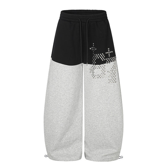 Damen Oversize Two‑Tone Palazzo‑Sweathose aus French Terry mit Logo‑Nieten, Tunnelzug und verstellbarem Saum Shop Nory
