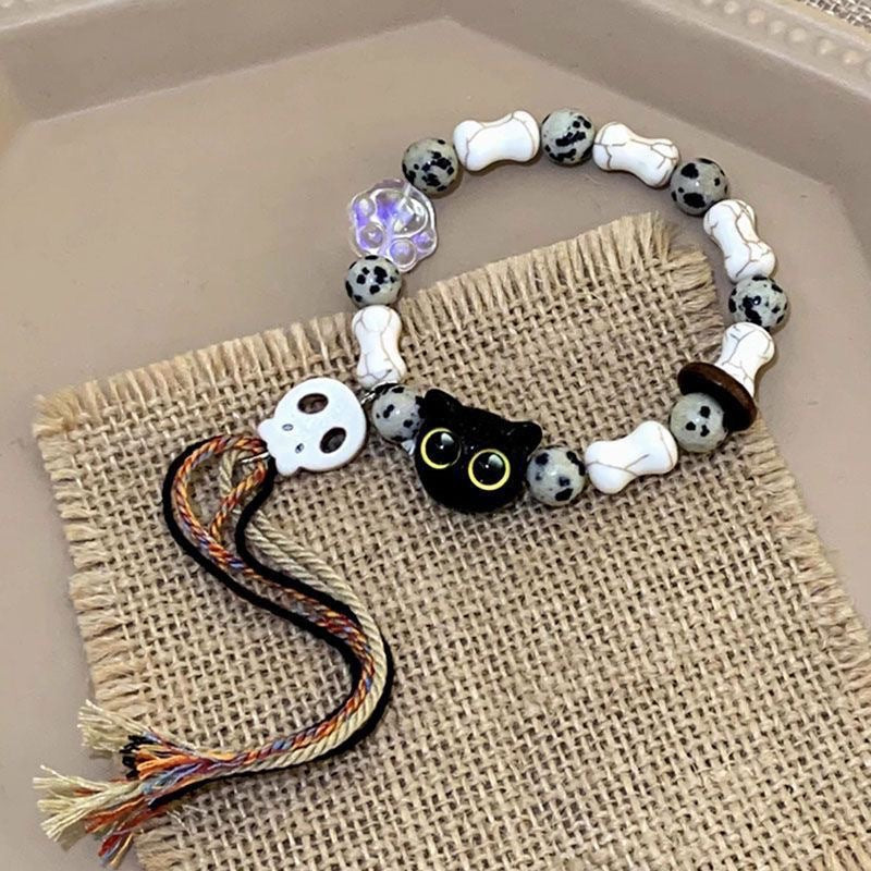 Damen Armband mit handgefertigten Tiermotiven und bunten Perlen Shop Nory