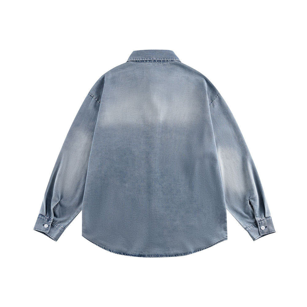 Unisex Oversize Denim-Hemdjacke mit gerundetem Saum und gesticktem Brustmotiv Shop Nory