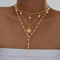 Damen Multilayer-Halskette mit strahlendem Sonnenanhänger und Perlenakzenten Shop Nory