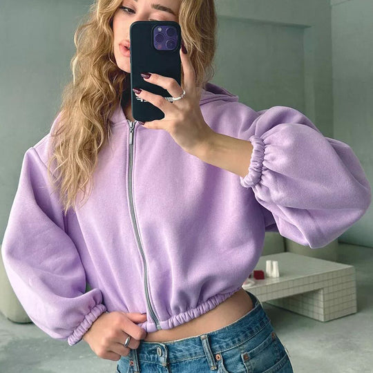 Damen kurzes Oversize-Kapuzen-Sweatshirt mit Reißverschluss, Ballonärmeln und elastischem Saum Shop Nory