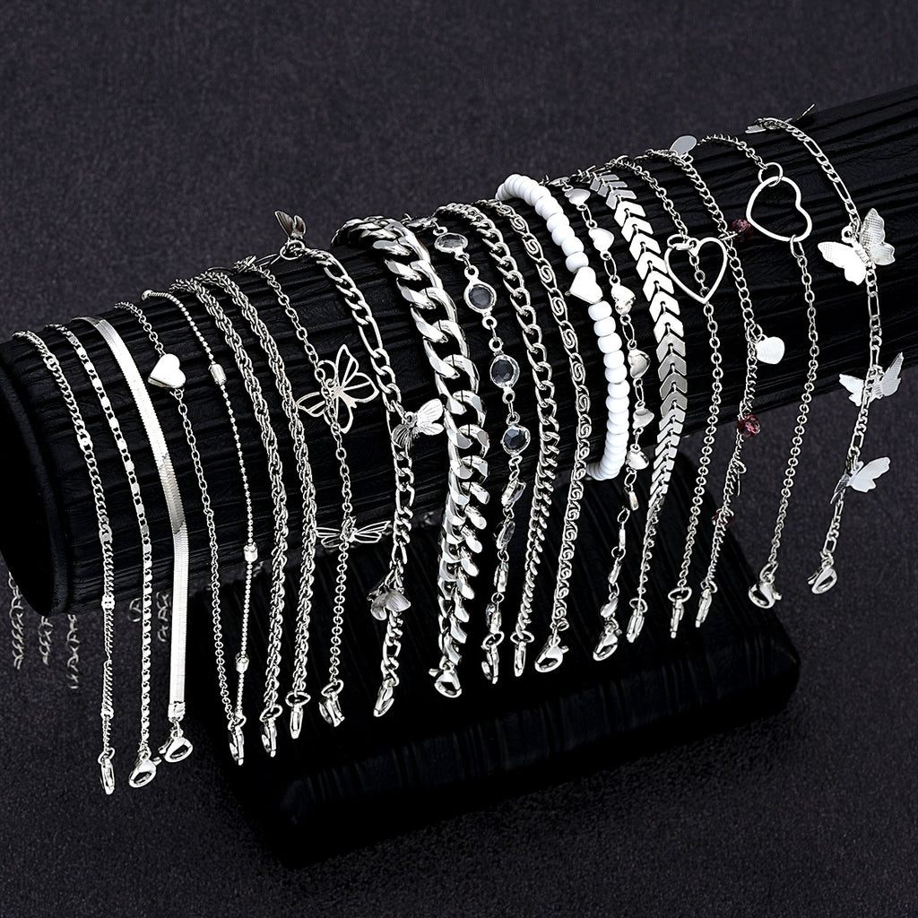 Damen Fußkettchen-Set mit zarten Anhängern und filigranen Designs Shop Nory
