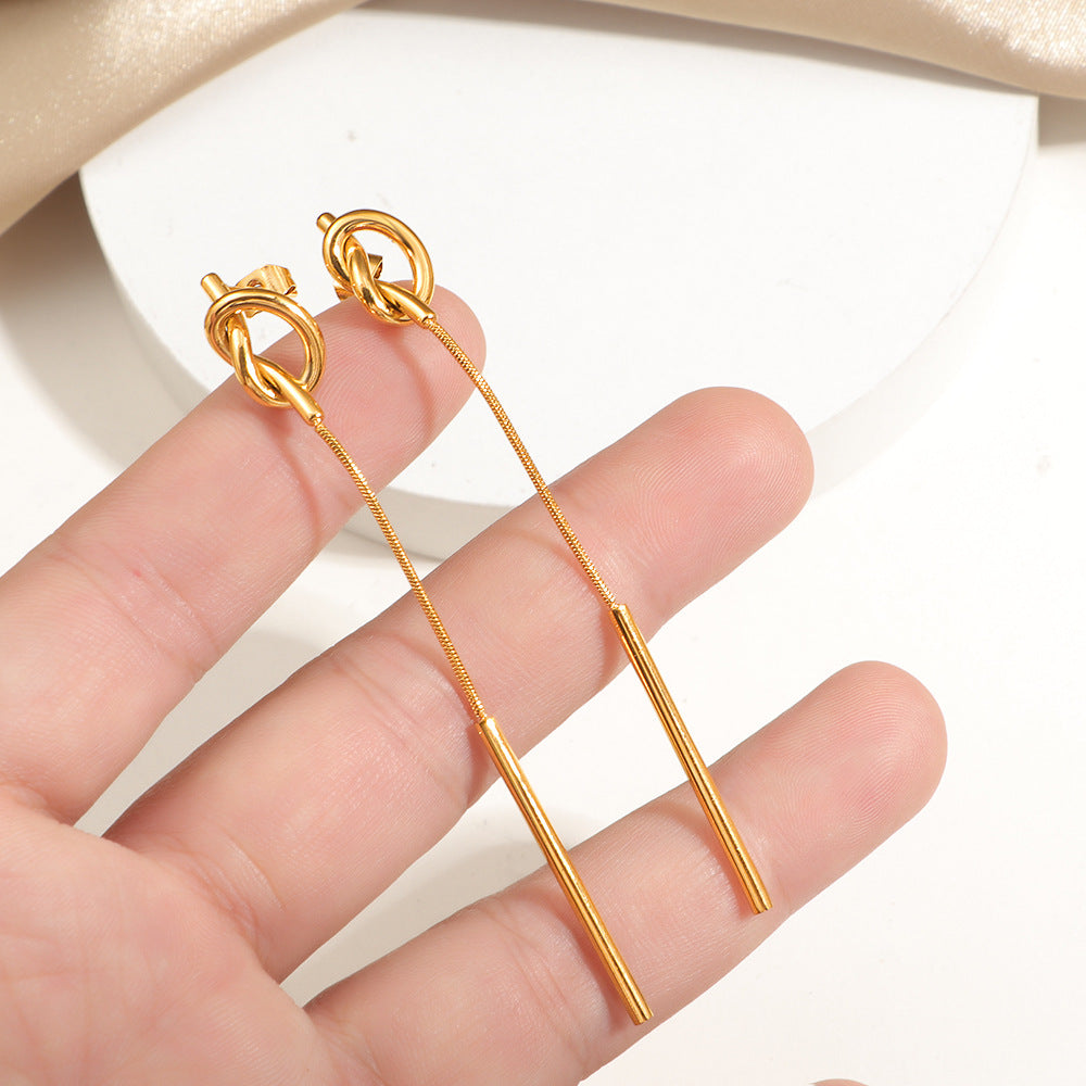 Damen zeitgenössische gedrehte Tropf Ohrringe Shop Nory