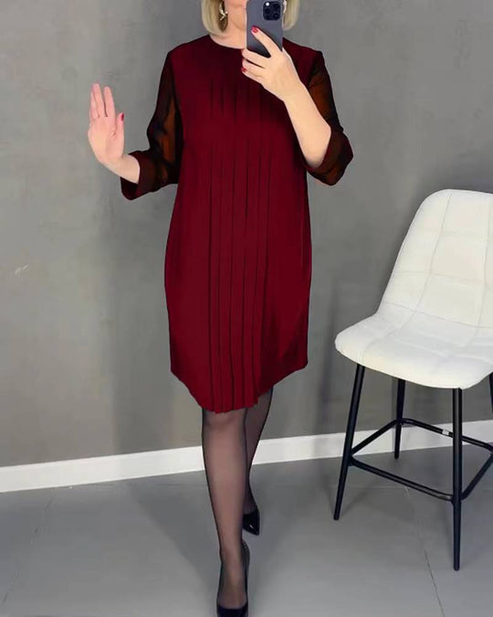 Damen Plissee Abendkleid mit transparenten Ärmeln und elegantem Schnitt