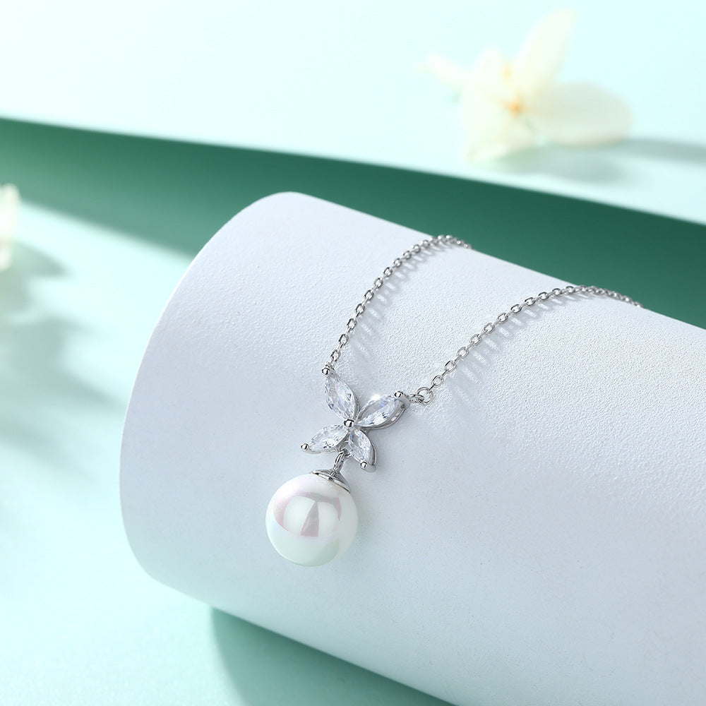 Damen Halskette mit elegantem Perlenanhänger und funkelnden Zirkonia-Details Shop Nory