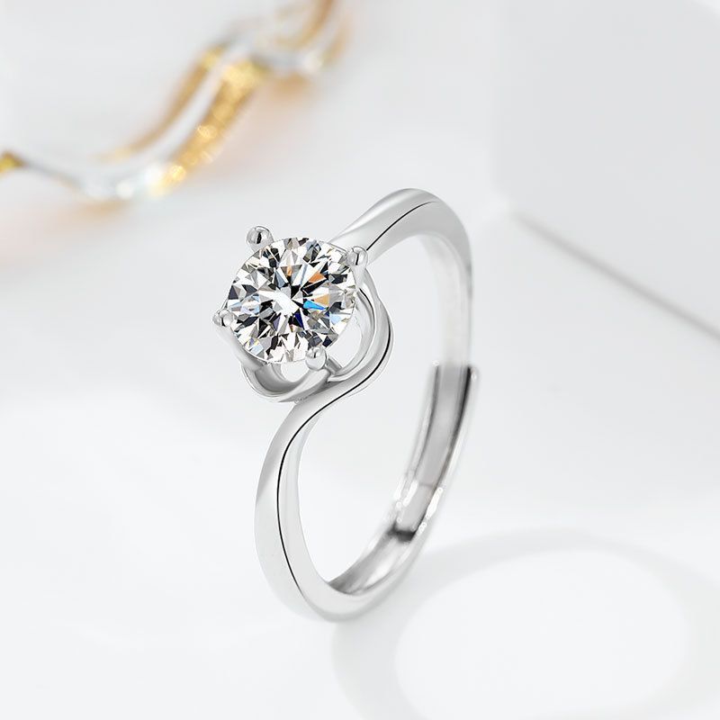 Damen eleganter Ring mit funkelndem Solitär und verspieltem Zirkonia-Besatz Shop Nory