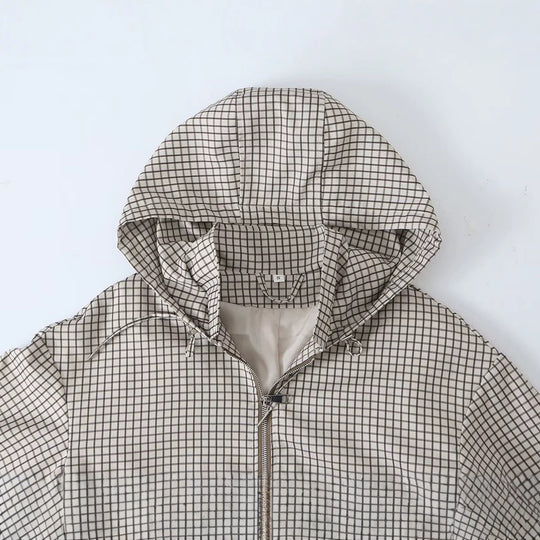 Damen Leichte Kapuzen-Boxy-Übergangsjacke mit Karo-Gitterprint, Tunnelzug und Elastikbündchen Shop Nory