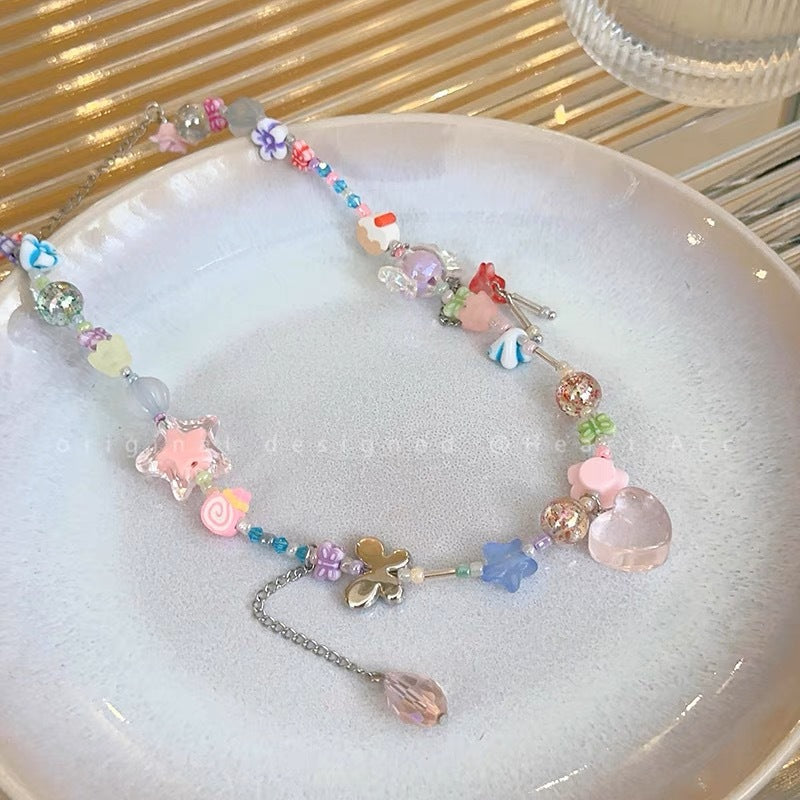 Damen Kette mit bunten Anhängern und handgefertigten Details Shop Nory