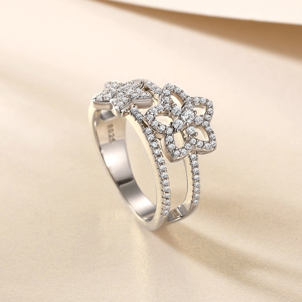 Damenring mit doppeltem, floralem Design und funkelndem Zirkonia-Besatz Shop Nory