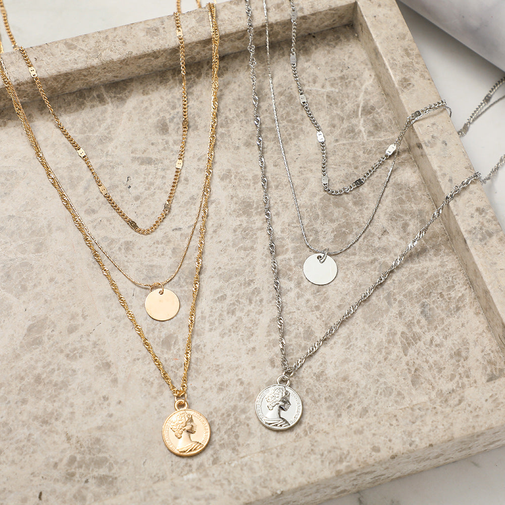Damen mehrlagige Halskette mit feinen goldenen Kettendesigns und elegante Medaillon-Anhänger Shop Nory