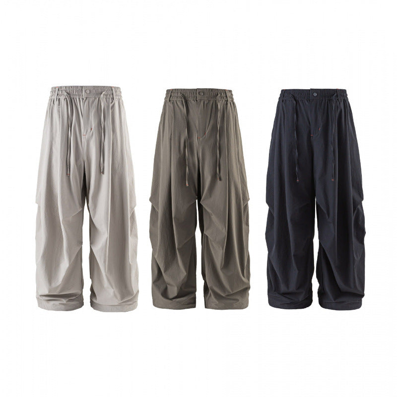Unisex Weitgeschnittene technische Cargo-Hose mit Gummibund, Kordelzug und Reißverschlusstaschen Shop Nory