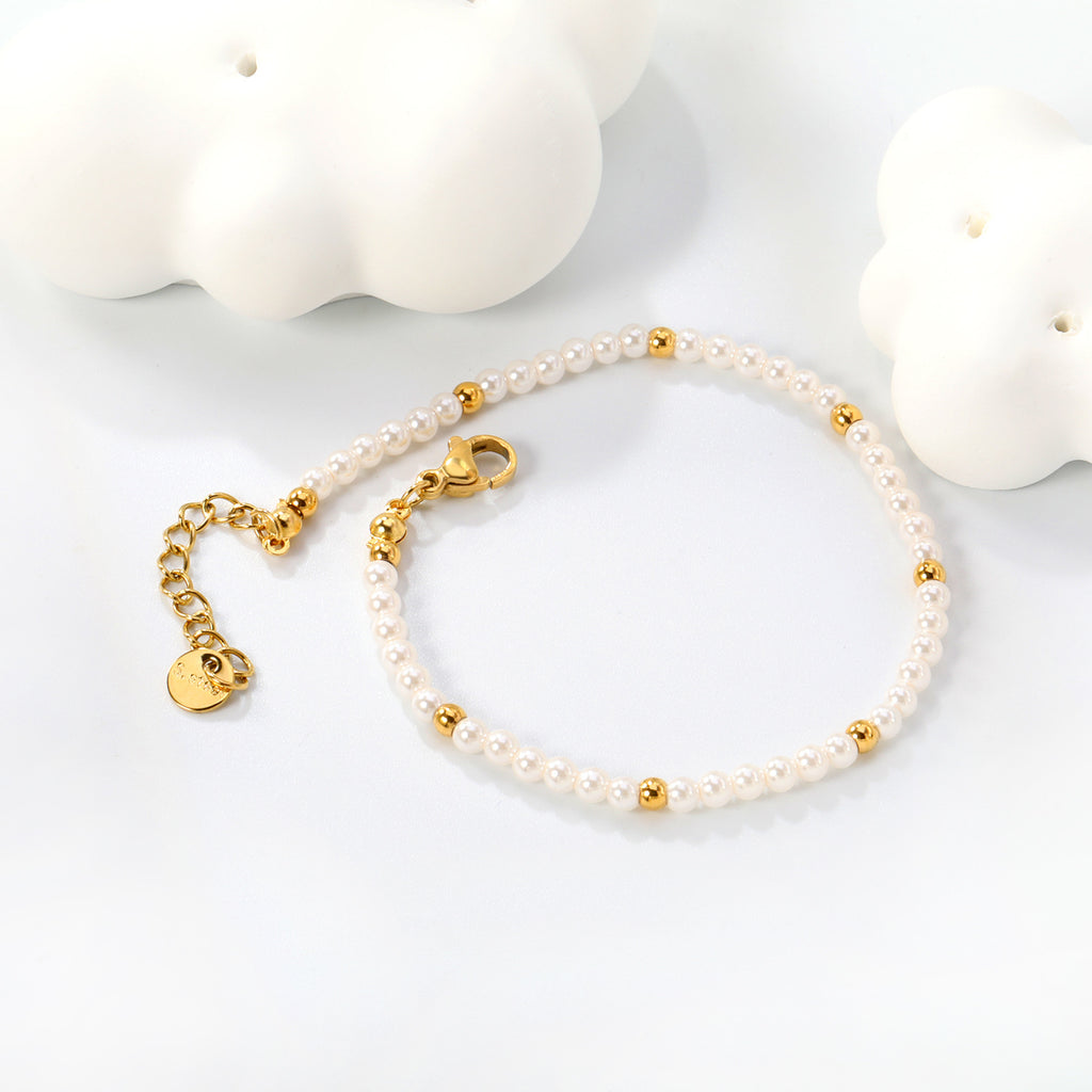 Damen zartes Armband mit Perlen- und goldplattierten Akzenten Shop Nory
