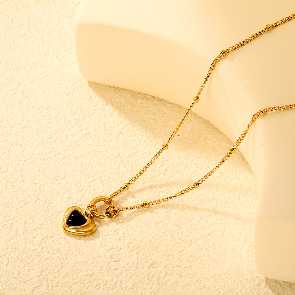 Damen Halskette mit herzförmigem Anhänger aus hochwertigem Edelstahl und feiner Gliederstruktur Shop Nory