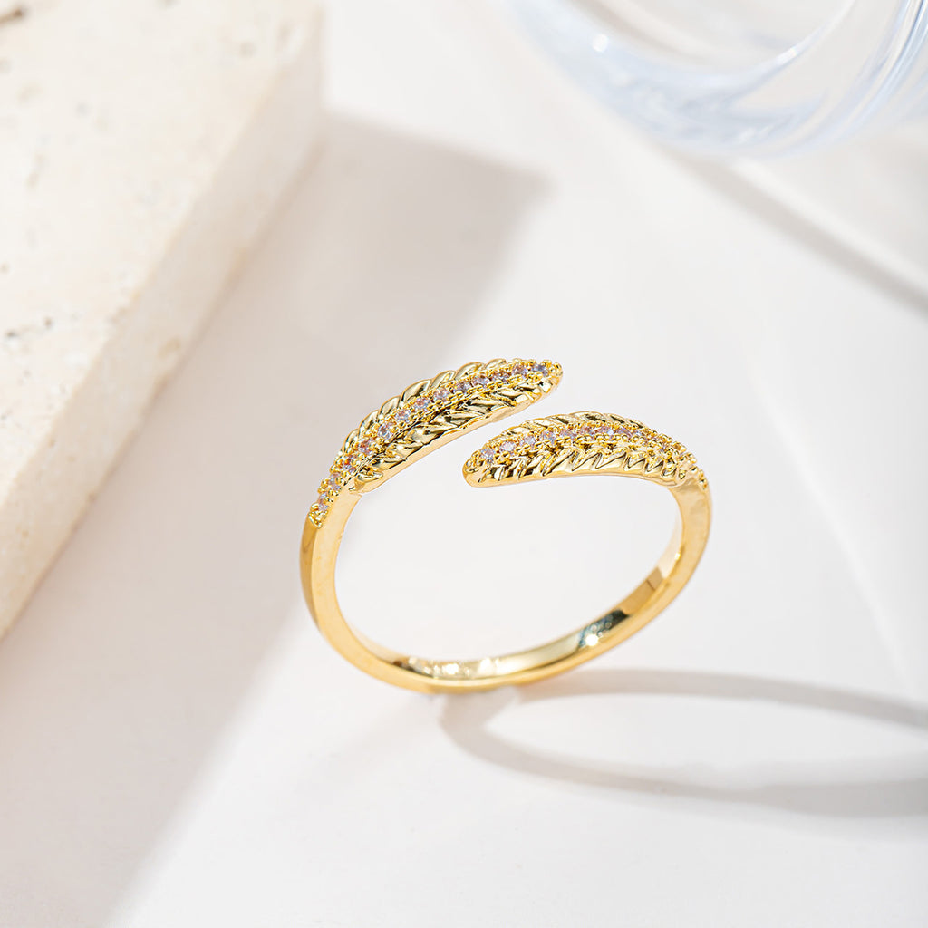 Damenarmreif mit floralem Design und funkelnden Kristallen Shop Nory