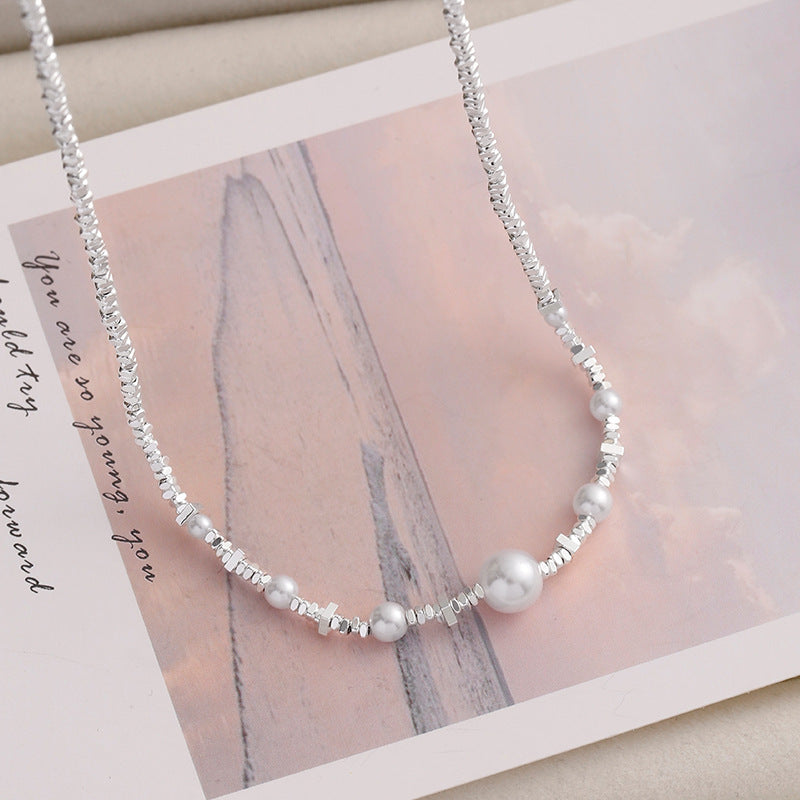 Damen Halskette mit edlen Perlen und stilvollen geometrischen Akzenten Shop Nory