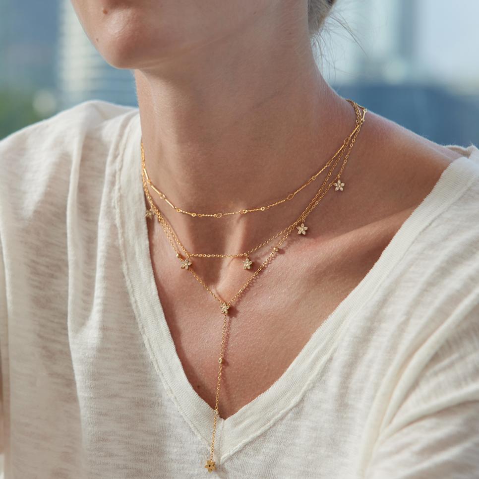 Damen Halskette mit mehrlagigem Design und funkelndem Sternanhänger Shop Nory