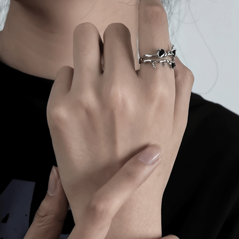 Damenring mit kunstvollem Wellendesign und bunten Edelsteinen Shop Nory