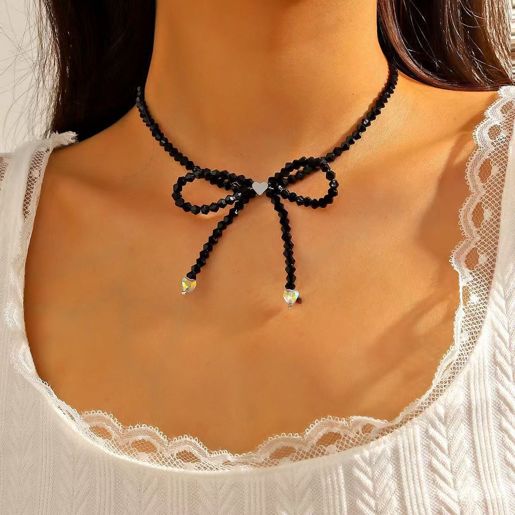 Damen Kette mit funkelndem Schleifenanhänger Shop Nory