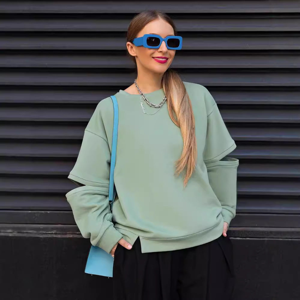 Damen Oversized Sweatshirt mit Layer-Ärmeln und seitlichem Schlitz Shop Nory