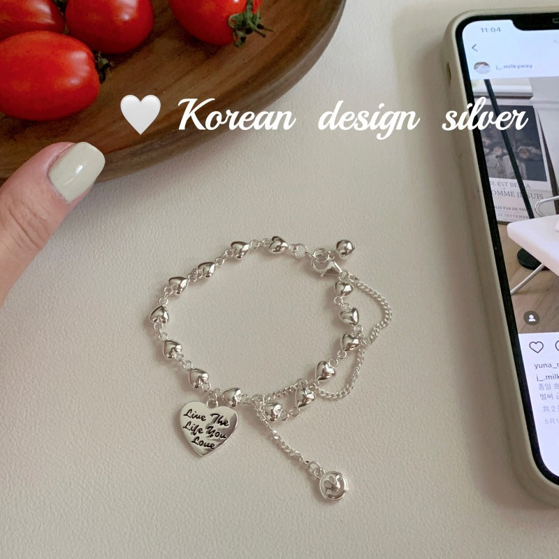 Damenarmband mit herzförmigem Anhänger aus hochwertigem Silber und verspieltem Design Shop Nory