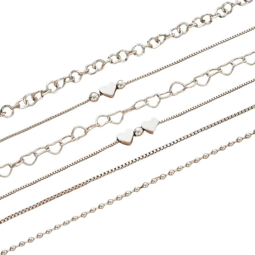 Damen Armband-Set mit filigranen Herzmotiv und funkelnden Akzenten Shop Nory