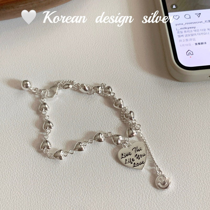 Damenarmband mit herzförmigem Anhänger aus hochwertigem Silber und verspieltem Design Shop Nory