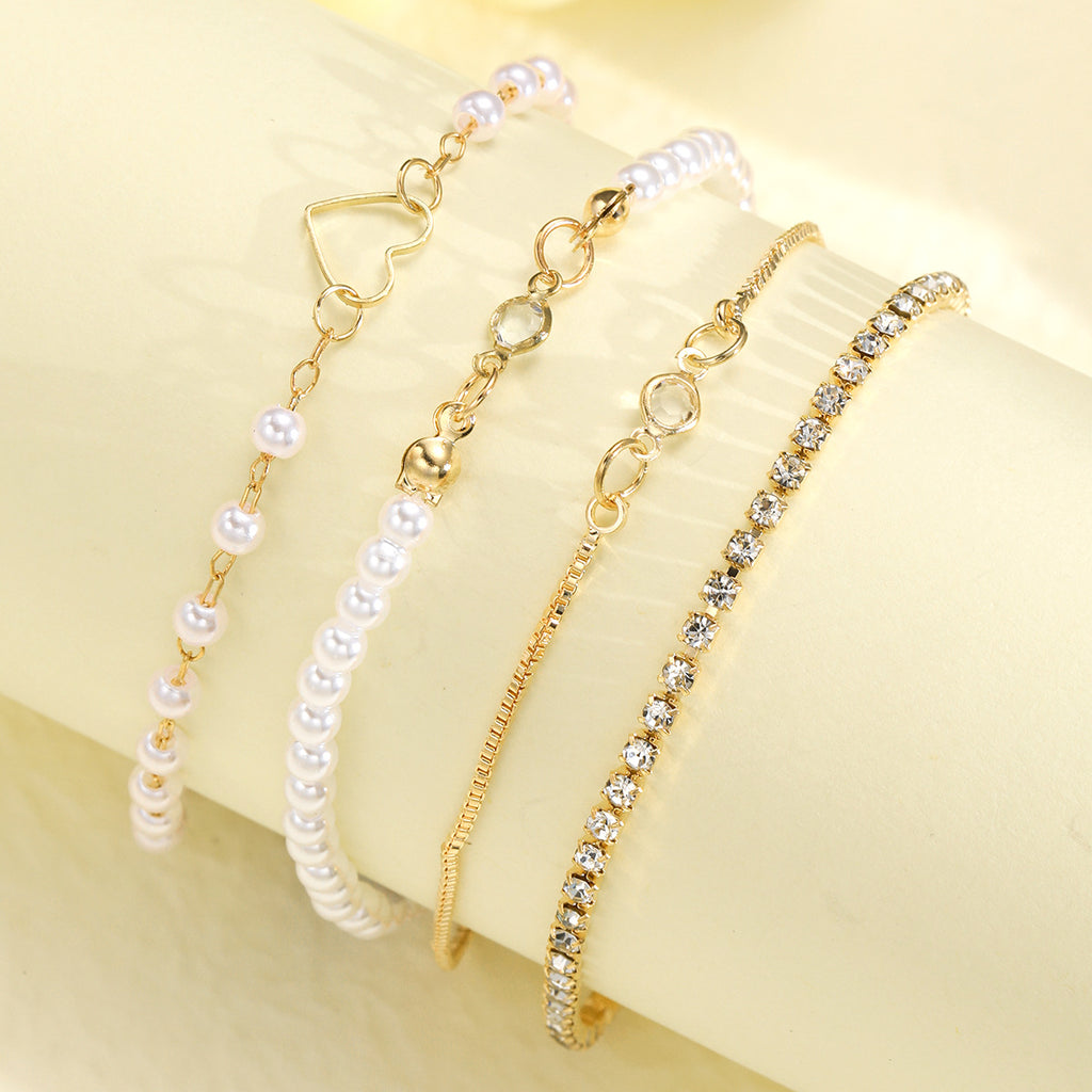 Damen Armband-Set mit feinen Perlen und glitzernden Akzenten Shop Nory