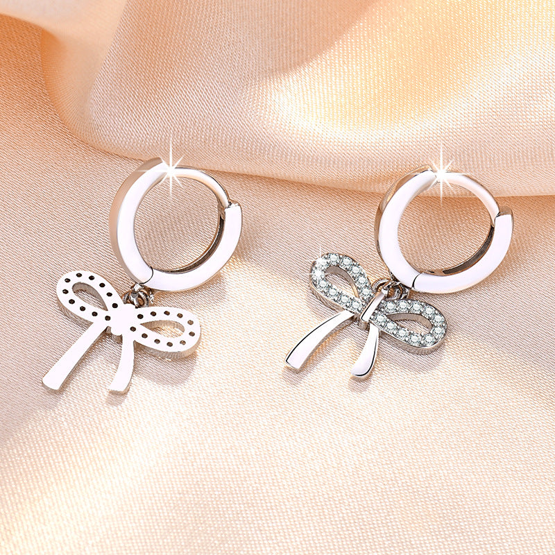 Damen Ohrstecker mit funkelndem Schleifen-Design und eleganten Zirkonia-Details Shop Nory