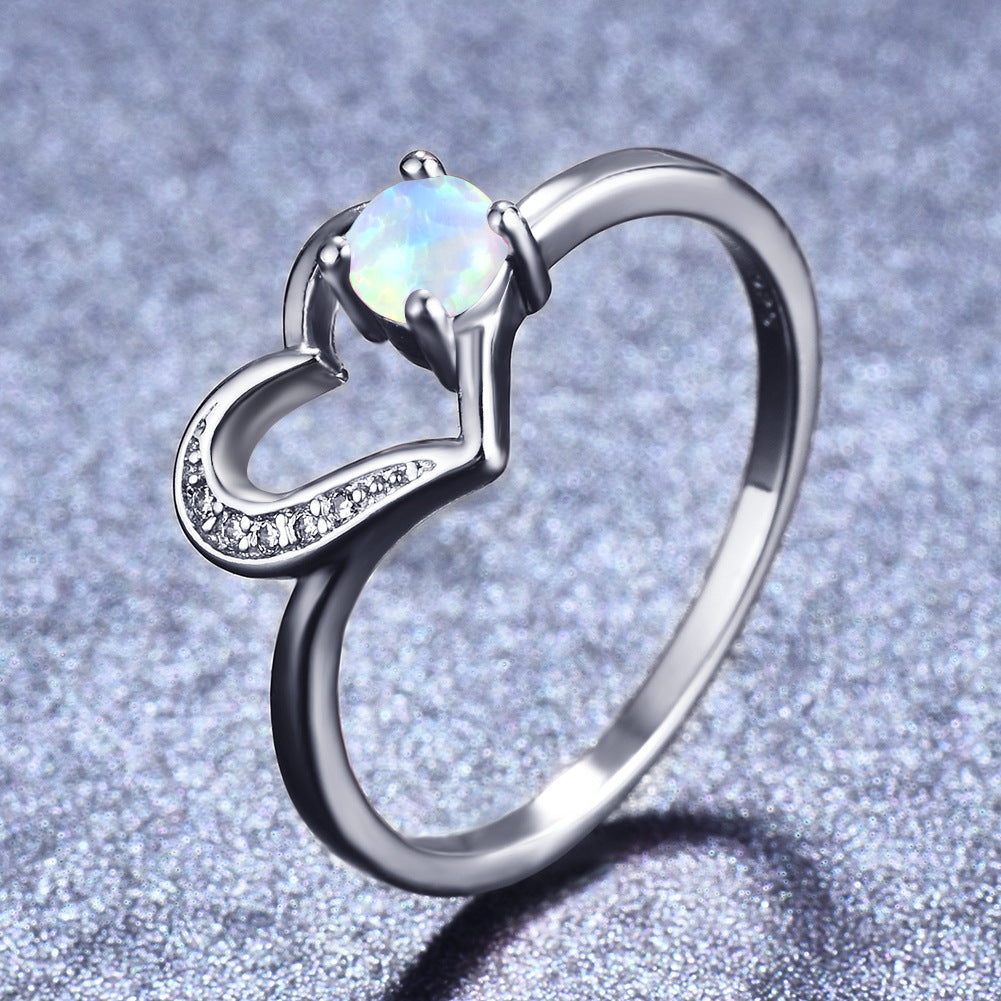 Damen Ring mit herzförmigem Design und funkelndem Opal Shop Nory