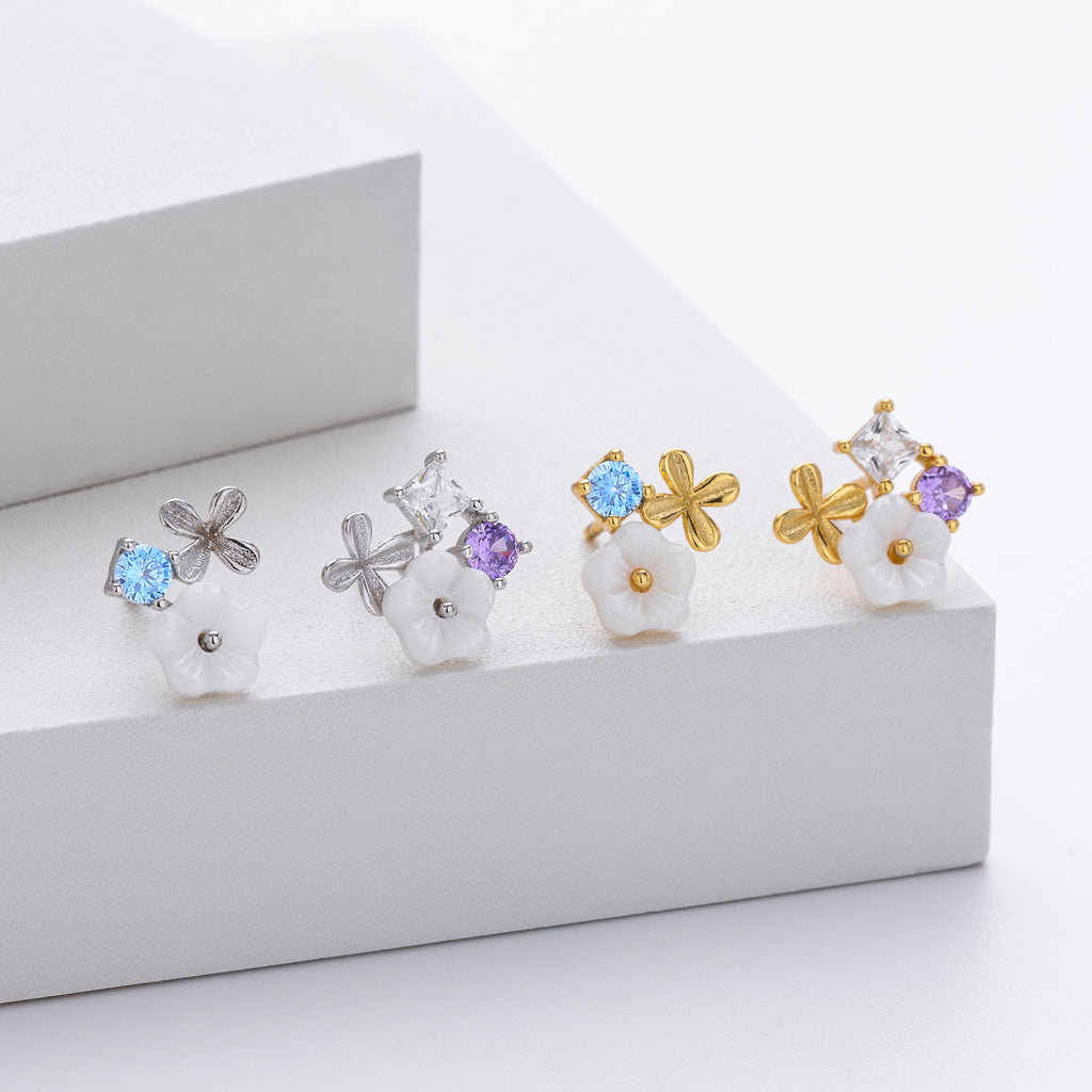 Damen Ohrstecker mit funkelnden Zirkonia in elegantem Blüten-Design Shop Nory
