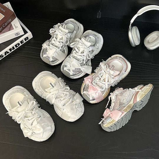 Damen Chunky‑Sneaker mit floraler Spitze und Satin‑Schleife Shop Nory