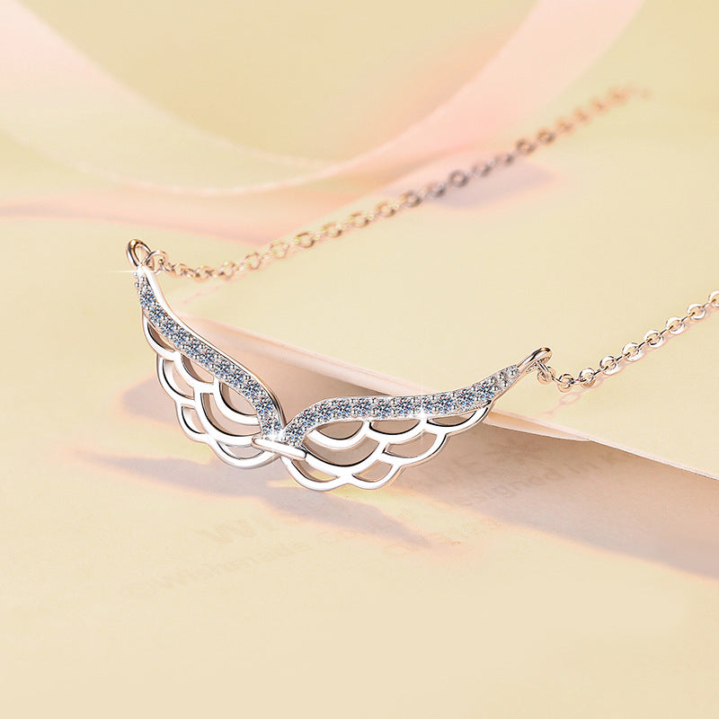 Damen Halskette mit elegantem Flügel-Design und Zirkonia-Besatz Shop Nory