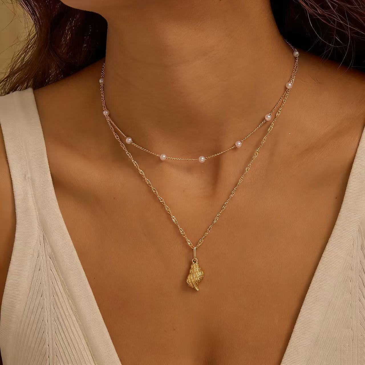 Damen mehrlagige Halskette mit Muschel- und Perlenanhängern Shop Nory