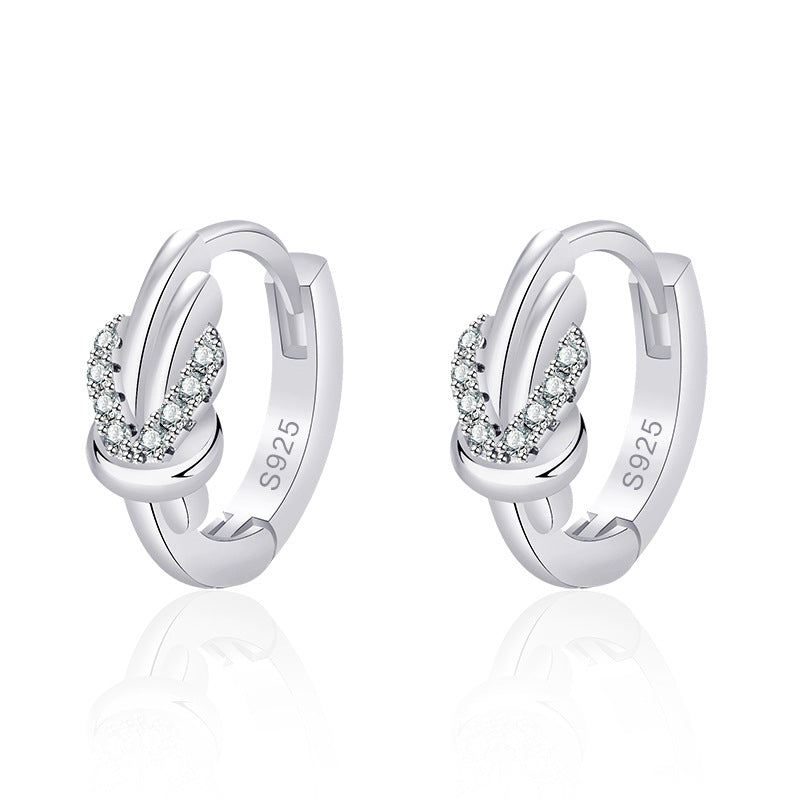 Damen Ohrringe mit elegantem Knoten-Design und funkelndem Zirkonia-Besatz Shop Nory