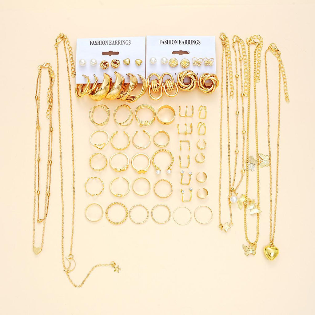 Damen Schmuckset mit mehrlagigen Ketten und vielfältigen Ringen Shop Nory