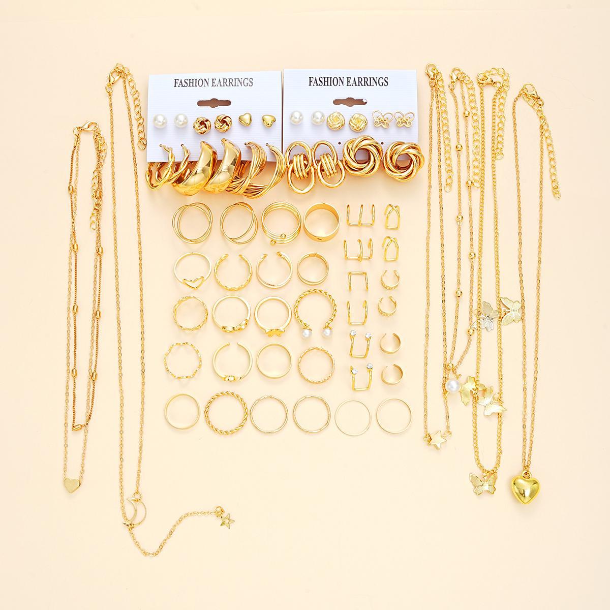 Damen Schmuckset mit mehrlagigen Ketten und vielfältigen Ringen Shop Nory