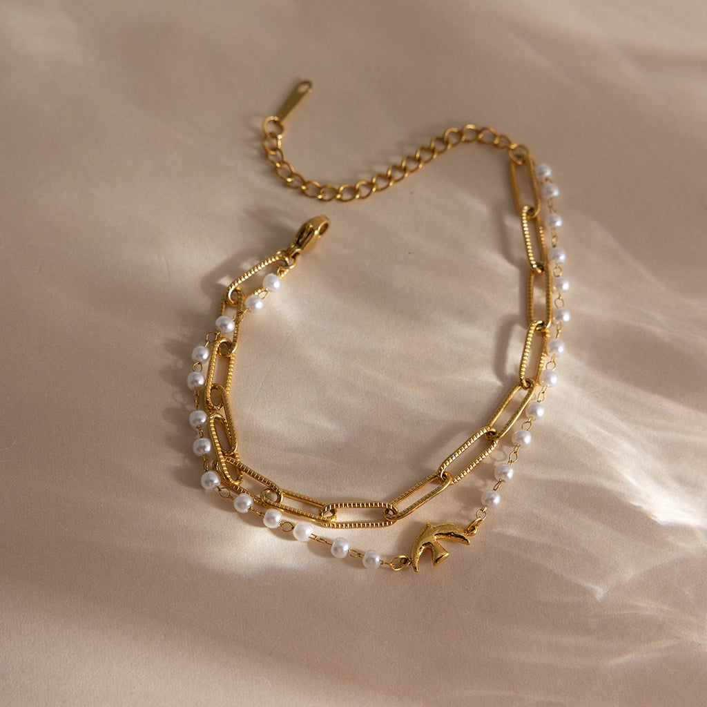 Damen Elegantes Edelstahlarmband mit Perlenakzenten und filigranem Design Shop Nory