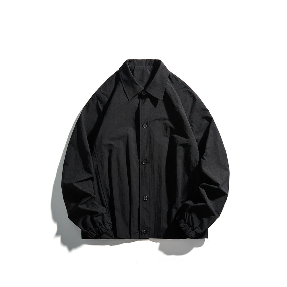 Unisex Leichte Hemdjacke im Boxy-Schnitt mit Holzknopfleiste und elastischen Bündchen Shop Nory