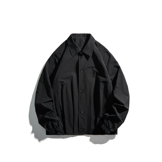 Unisex Leichte Hemdjacke im Boxy-Schnitt mit Holzknopfleiste und elastischen Bündchen Shop Nory