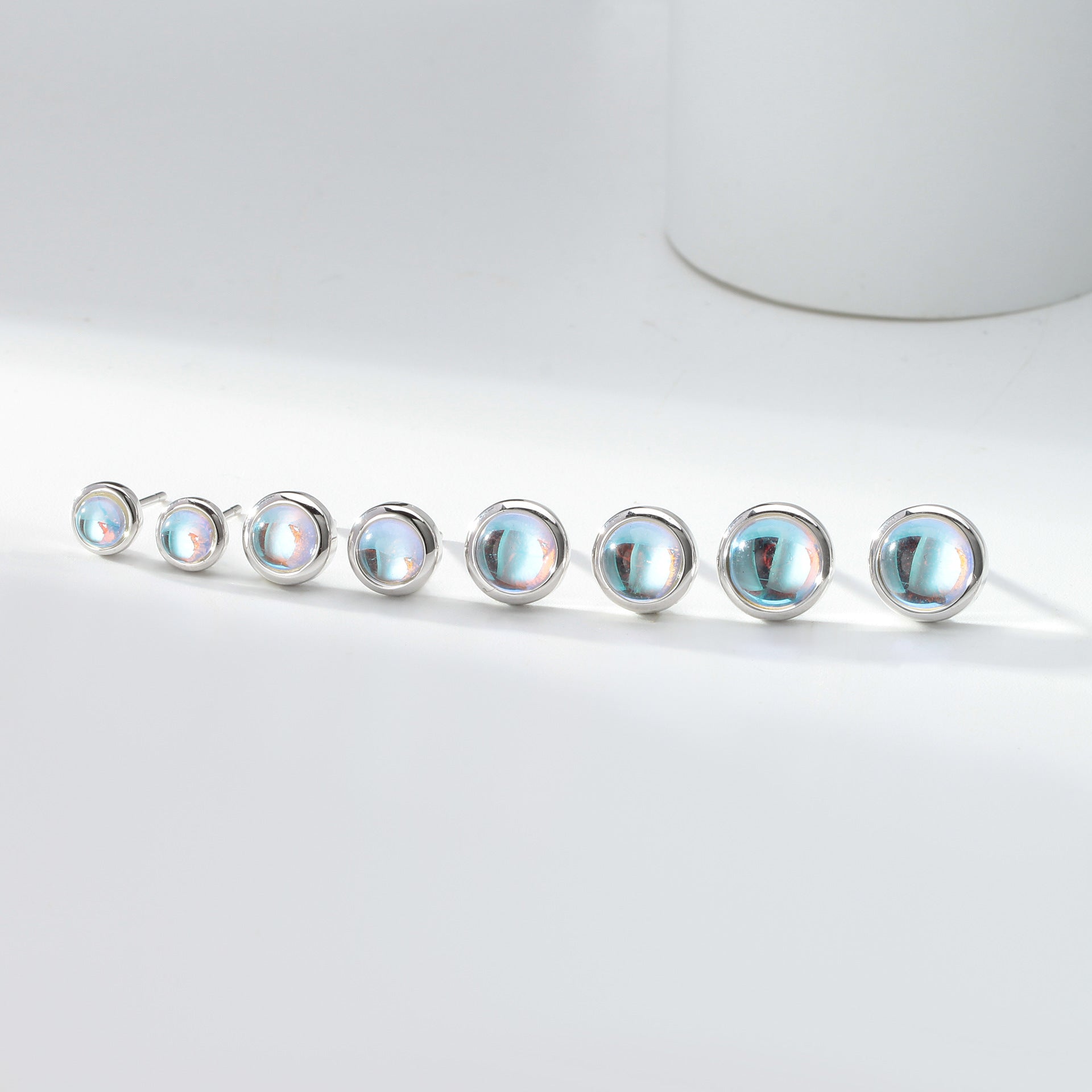 Damen Ohrstecker mit schimmerndem Opal-Effekt und hochwertiger 925 Sterling Silberfassung Shop Nory