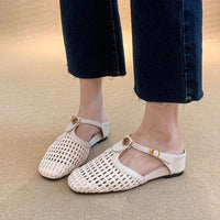 Beige T‑Riemen