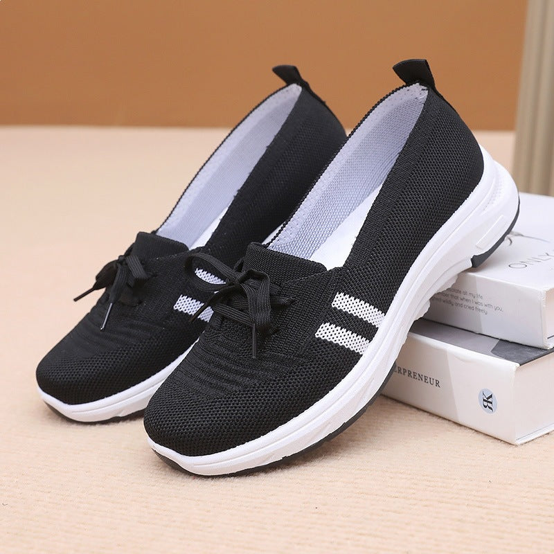 Damen Schlupf-Strick-Sneaker mit dekorativer Schleife und gedämpfter Plateausohle Shop Nory
