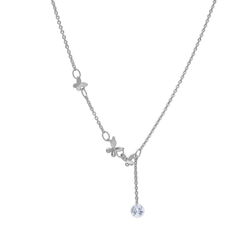 Damen Halskette mit zarten Anhängern und funkelnden Kristall-Details Shop Nory