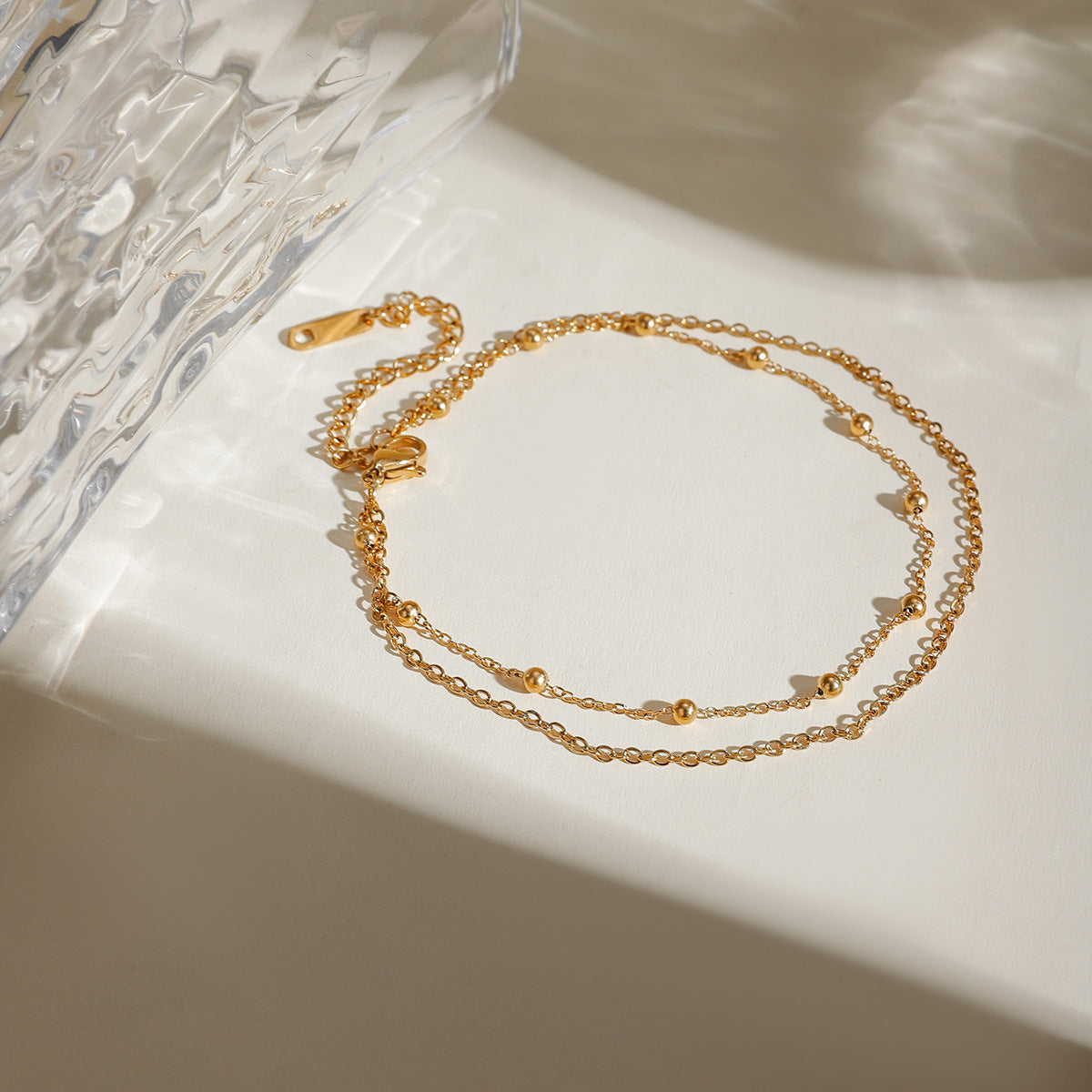 Damen Armband mit doppeltem Kettendesign und Zirkonia-Akzenten Shop Nory