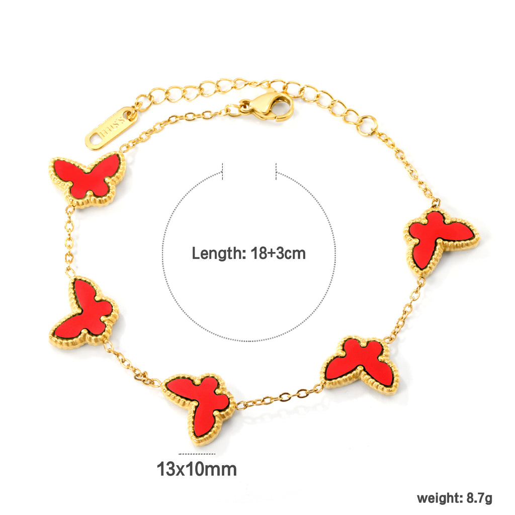 Damen Armband mit bunten Schmetterlingsanhängern und hochwertiger Goldbeschichtung Shop Nory