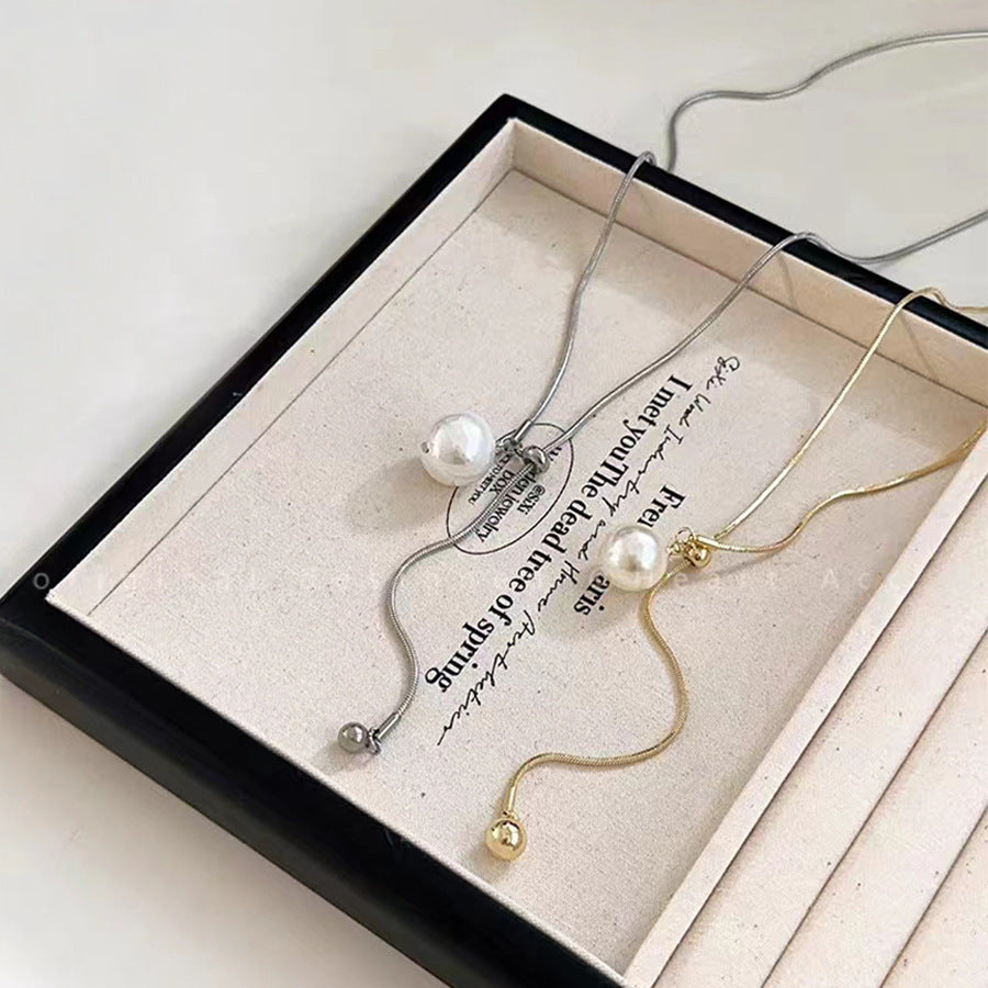 Damen Lange Halskette mit zeitlosem Perlenanhänger Shop Nory